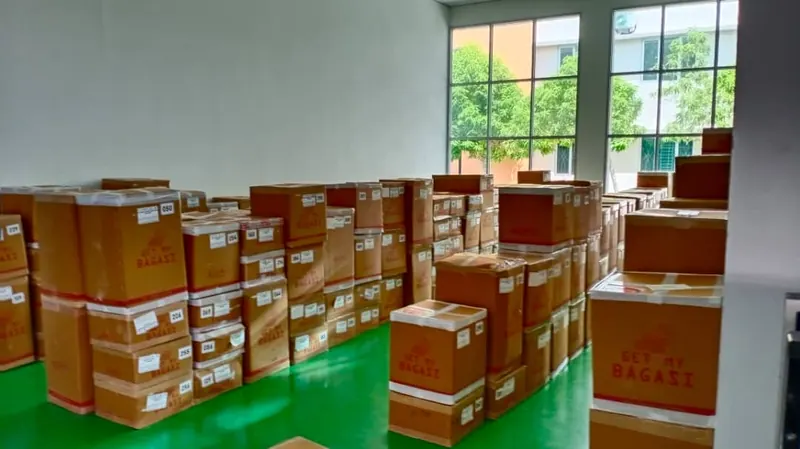 Rows of packed cartons lined up before loading